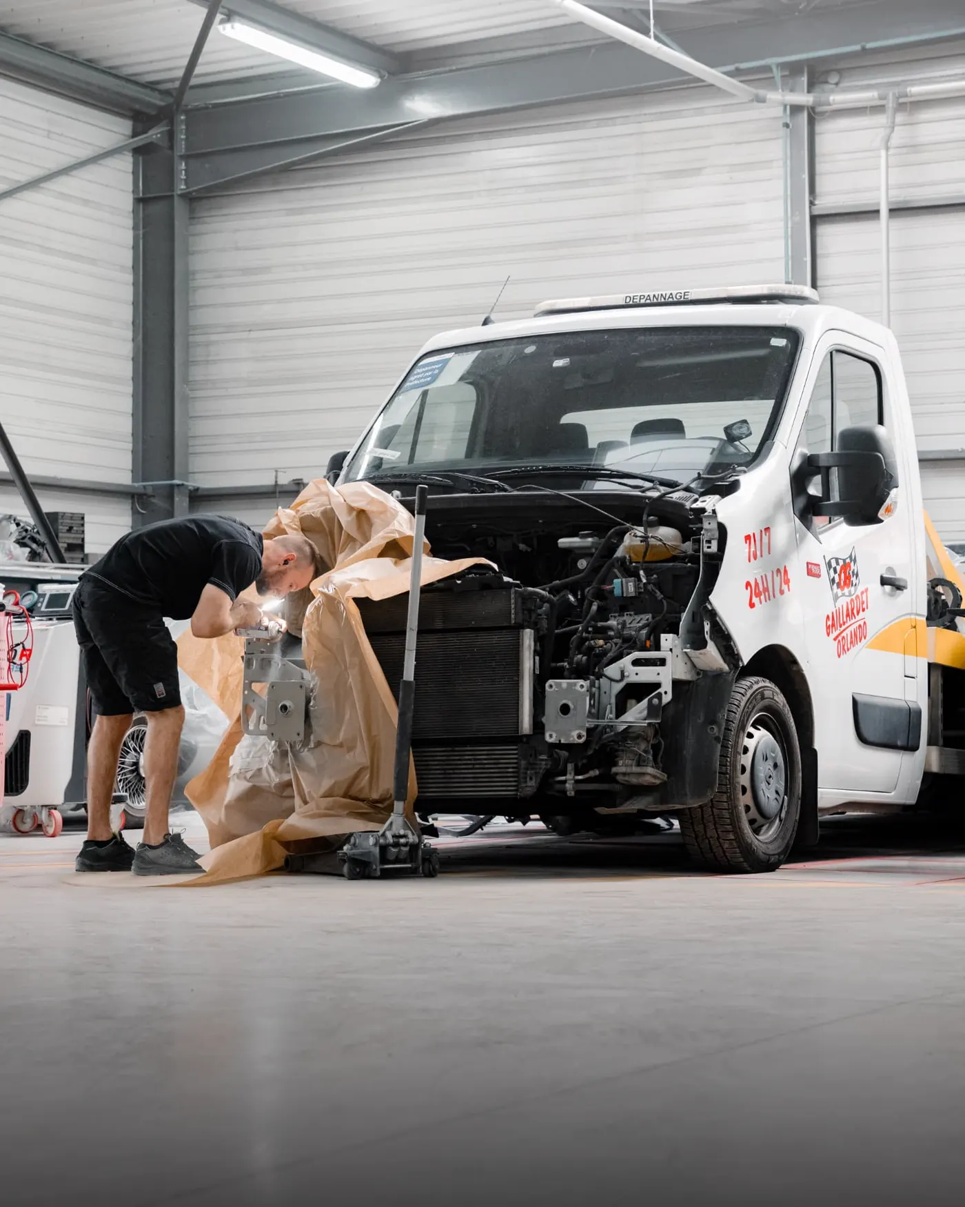 Reparation d'un vehicule d'assistance dans un atelier de carrosserie